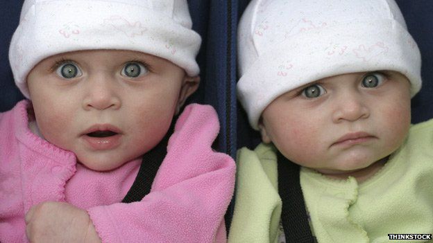 twins with different colored eyes