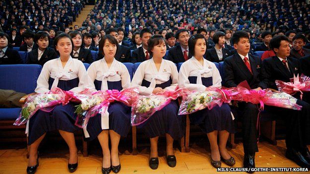 The audience in a North Korean concert hall