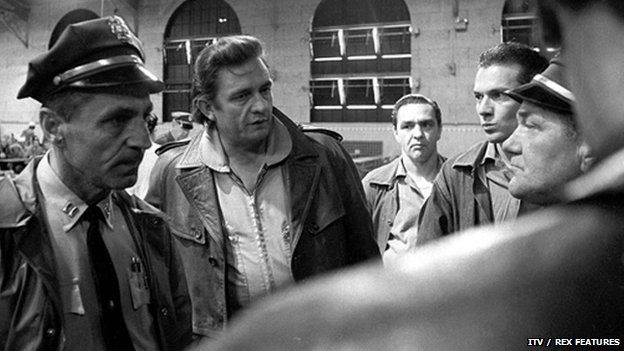 Johnny Cash talking to prison guards at San Quentin prison
