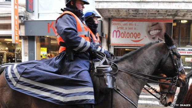 Mounted police in the Matonge district in Brussels, in December 2011, after the re-election of Joseph Kabila as DRC president