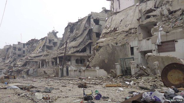 Damaged buildings in Homs (25 January 2013)