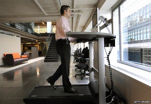 A man at a treadmill desk