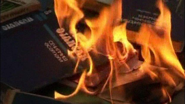 Public burning of Aylisli's books - screen grab from Reuters TV