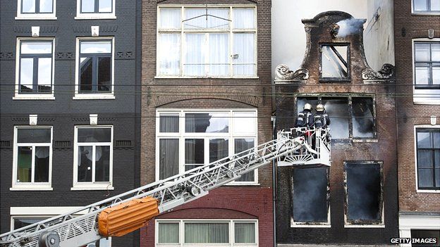 Amsterdam fire fighters attend a fire in the city centre