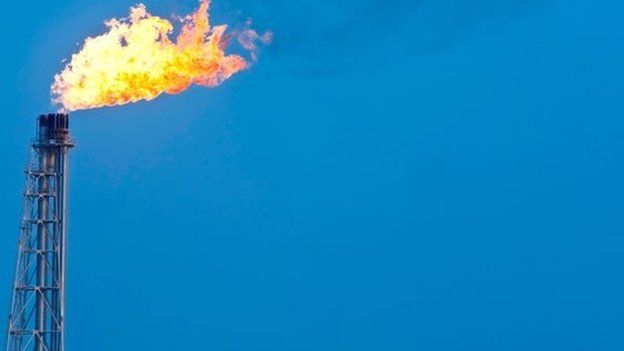 Gas flare against a blue sky