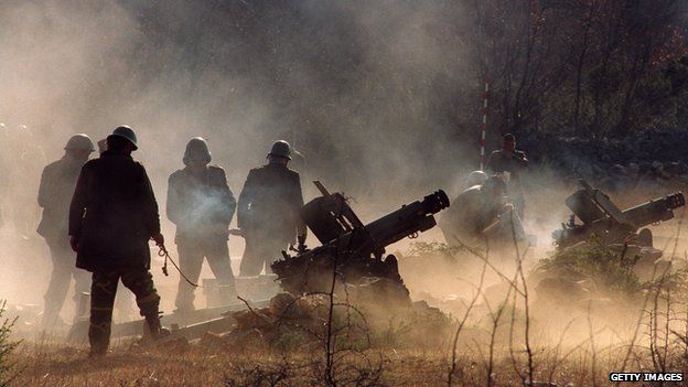 Serbian guns fire on Croatian targets during the 1991 conflict between Croatia and Serbs