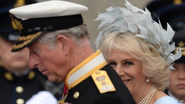 Britain's Prince Charles of Wales and the Duchess of Cornwall leave the Nieuwe Kerk in Amsterdam, 30 April 2013