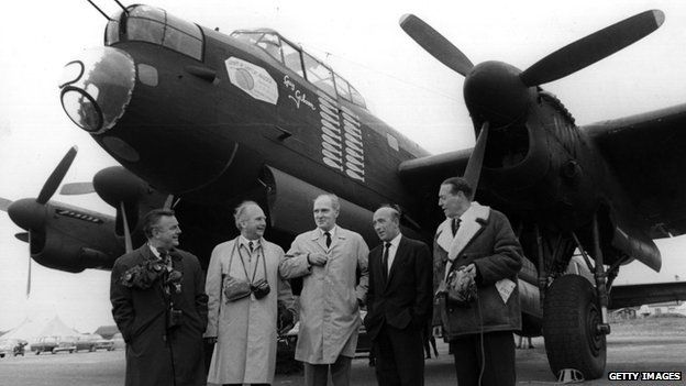 19th May 1967: Members of the original Dam Busters crew stand in front of a Lancaster bomber like the ones they flew during WWII
