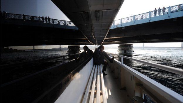 Businessman travels across Bosporus river