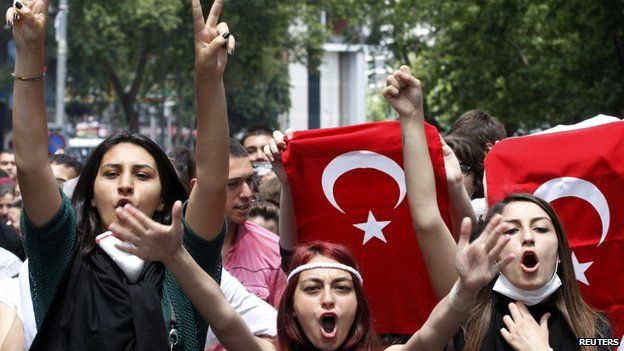 Protesters shout anti-government slogans during a demonstration in Ankara 3 June 2013
