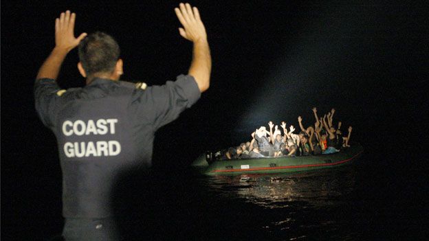 Coastguard signals to refugee boat