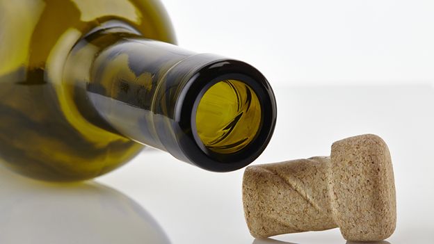 A Helix cork next to an empty bottle