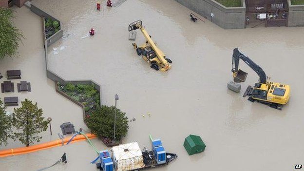 Flood waters surround the hospital in Canmore, Alberta