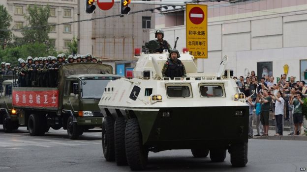 In pictures: China steps up security in Xinjiang - BBC News