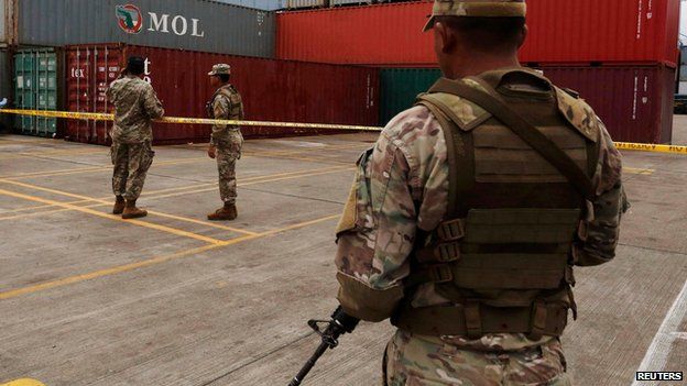 Panamanian soldiers guard cargo seized from North Korea ship, Colon City (17 July)