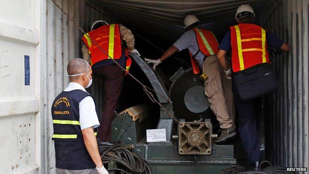 Forensic workers examine containers from North Korean ship, Colon City (17 July)