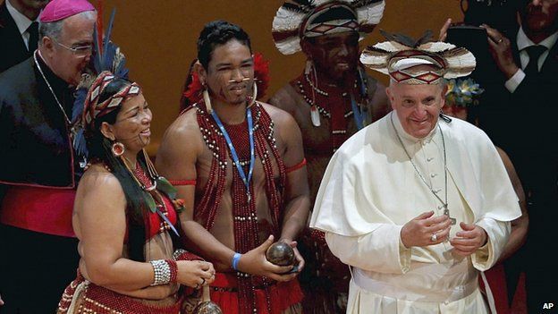 Pope wears indigenous headdress. 27 June 2013