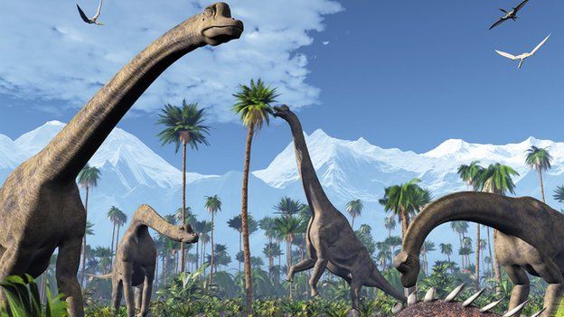 Artwork of four Brachiosaurus dinosaurs feeding in a forest of tree ferns next to snow-capped mountains