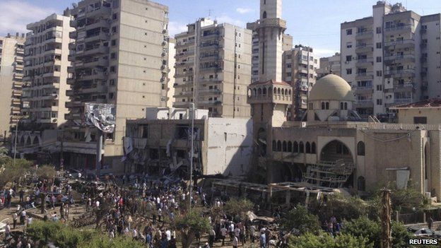 A general view outside one of two mosques hit by explosions in Lebanon's northern city of Tripoli on August 23, 2013. It shows the windows blown out.