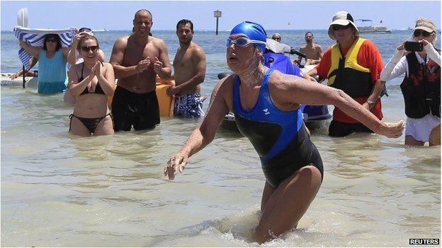 Diana Nyad walks on to the beach in Key West, Florida, on 2 September 2013