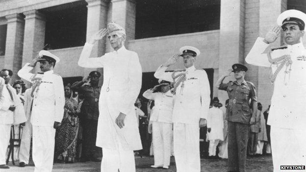 17th August 1947: Muhammad Ali Jinnah (1876-1948) taking the salute at a military march past in Karachi, having been sworn in as the first Governor General of the Muslim Dominion of Pakistan