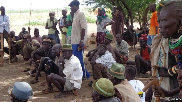 Community members from Nadapal village in Kakuma discuss planned drilling of wells, Kenya