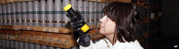 An operations manager inspects mustard agent shells in a US bunker in Pueblo, Colorado, on 21 January 2010 - some of the chemical weapons the US acknowledges it still possesses