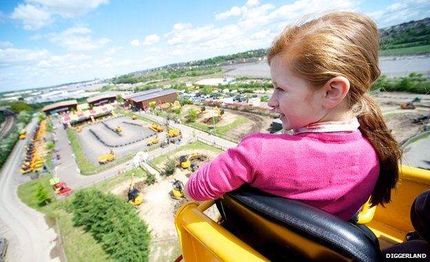 Girl sitting in digger. Permission given