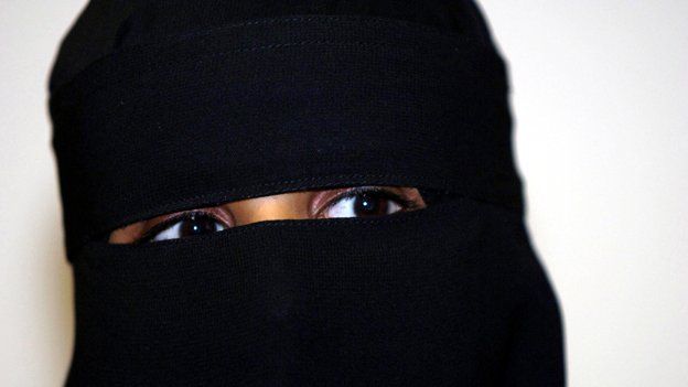 A Muslim woman wearing a niqab