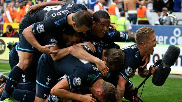 Spurs players celebrate winning in Cardiff