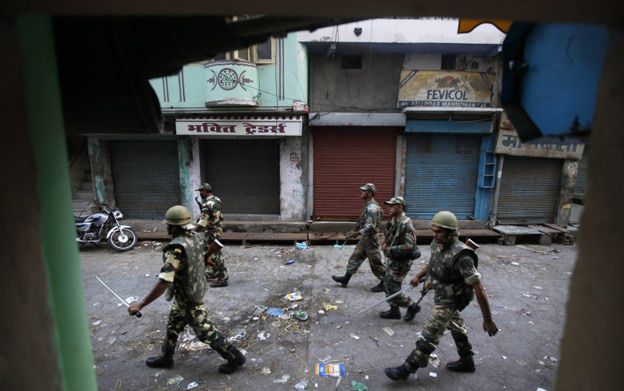 Indian army soldiers patrol curfew in Muzaffarnagar