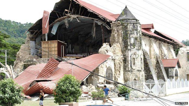 The collapsed facade of the San Pedro y San Pablo church in Loboc town, Bohol province