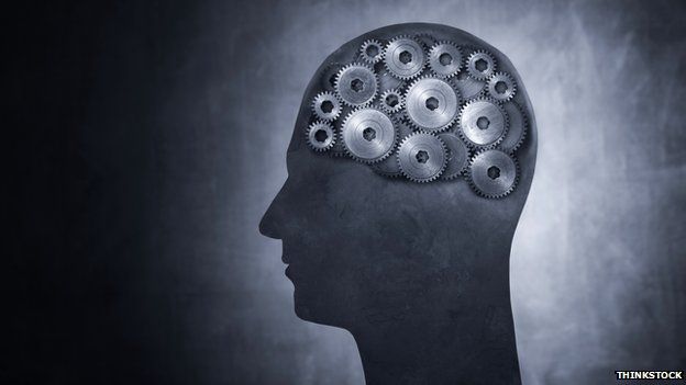 Image of a human head with cogs