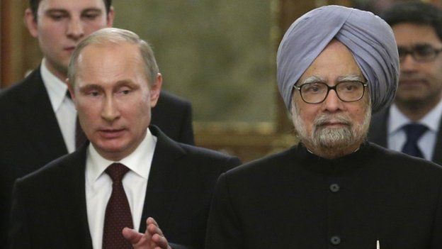 Russia"s President Vladimir Putin (L) speaks with India"s Prime Minister Manmohan Singh during their meeting in the Kremlin in Moscow, on October 21, 2013.