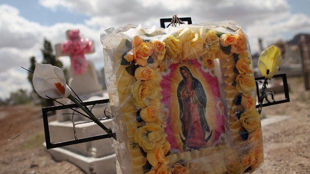 Graves in a cemetery in Juarez neighborhood where many of the deceased are victims of violent crime