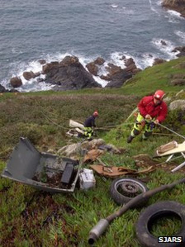Guernsey St John rescue team clears rubbish from cliff BBC News
