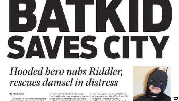 This Friday, 15 November 2013 image released by the San Francisco Chronicle shows a front page of the Gotham City Chronicle to honour Miles Scott, as Batkid