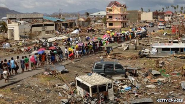 Philippines typhoon: UK commits extra £30m in aid - BBC News