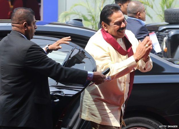 Sri Lankan President Mahinda Rajapaksa arrives for the final day of the summit in Colombo, 17 November