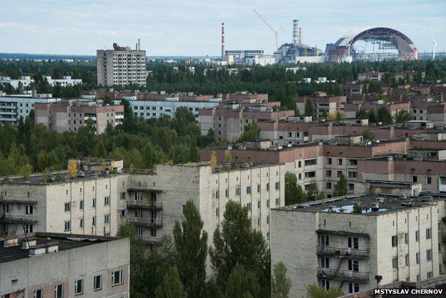 The arch being built at Chernobyl rises high above the nearby city