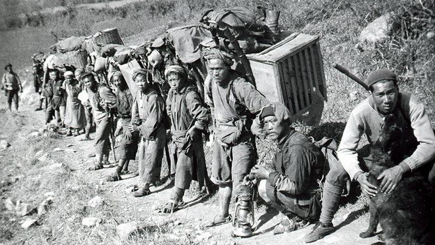 Porters carrying luggage
