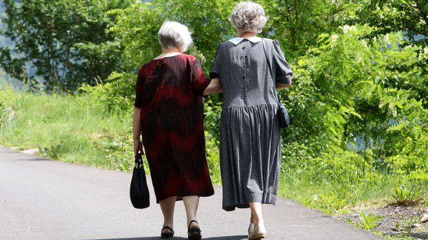 Elderly women out walking