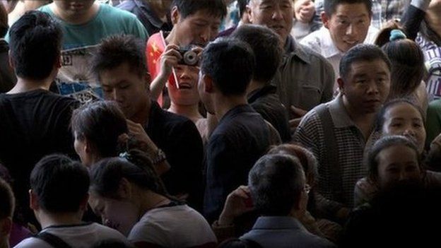 File photo of people in Beijing