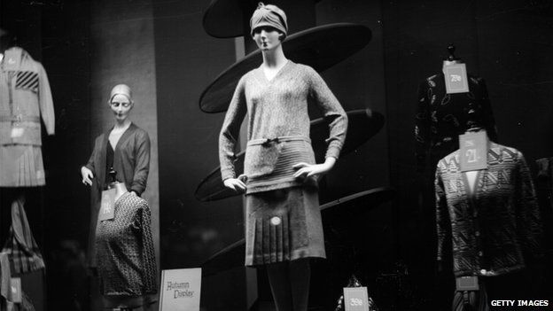 Circa 1930: Autumn knitwear in a shop window