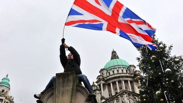 Union flag protester at Belfast City Hall