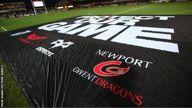 Welsh regional rugby supporters protest against the WRU before a Pro12 game