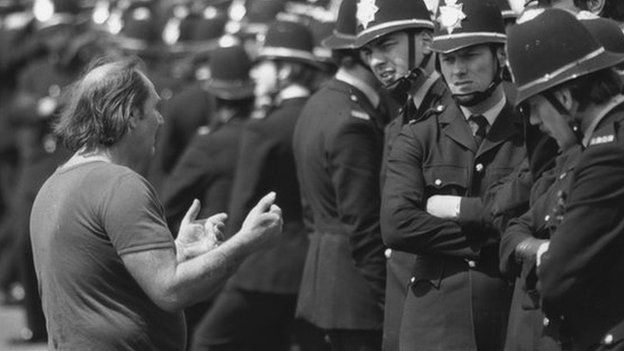 Picket talking to policemen during miners strike of 1984