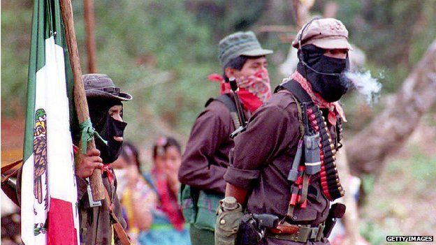 Subcomandante Marcos (right) waits for the arrival of Mexican opposition presidential candidate Cuauhtemoc Cardenas on 15 May 1994