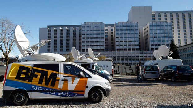 A TV van is parked in front of the Grenoble hospital, French Alps (Jan. 5 , 2014)