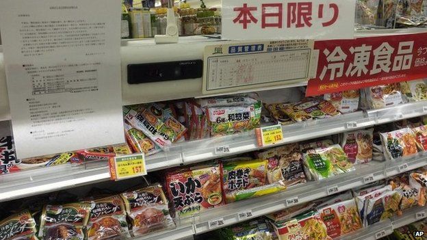 In this Tuesday, 7 January 2014 photo, the notice of apology and recall is placed on the shelves of frozen food products at a supermarket in Fujisawa, near Tokyo